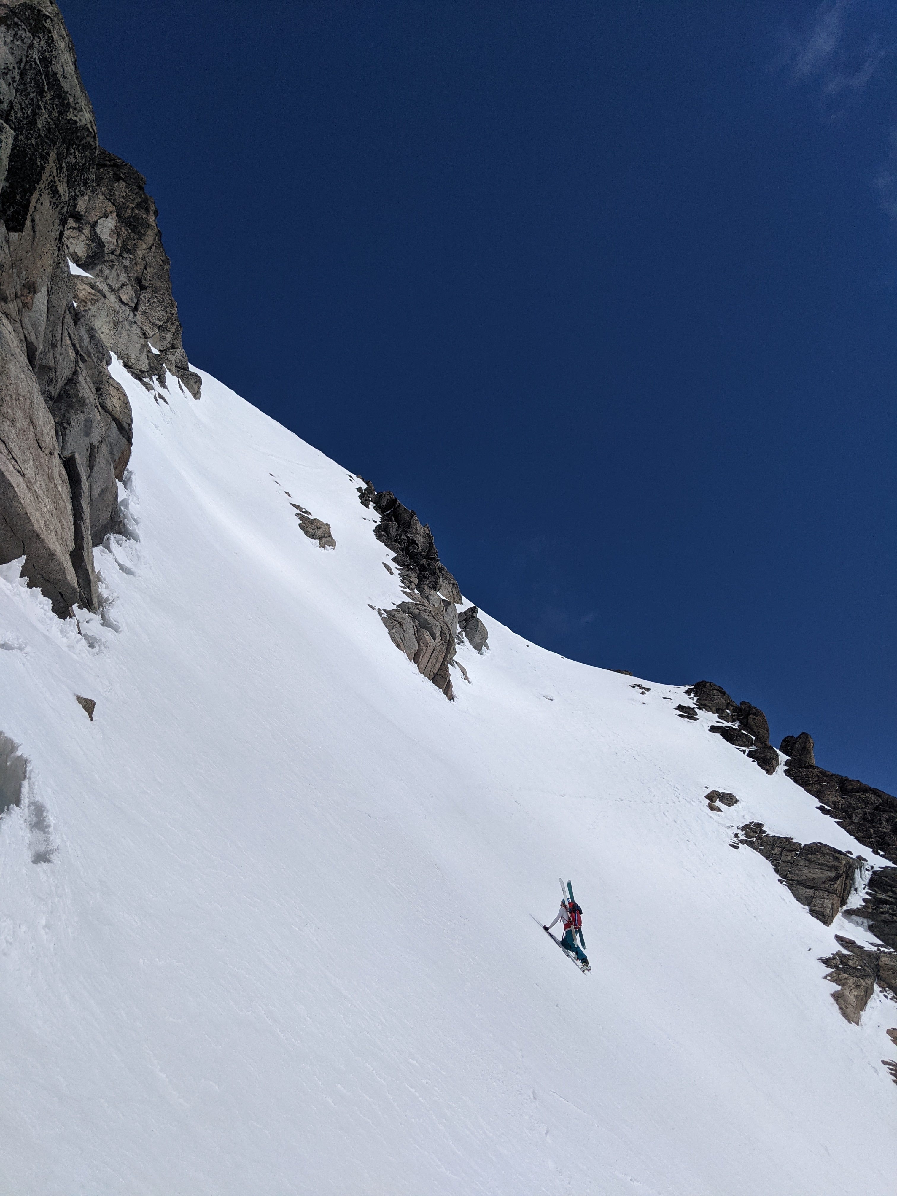 Ben booting up the last steep section before the false summit